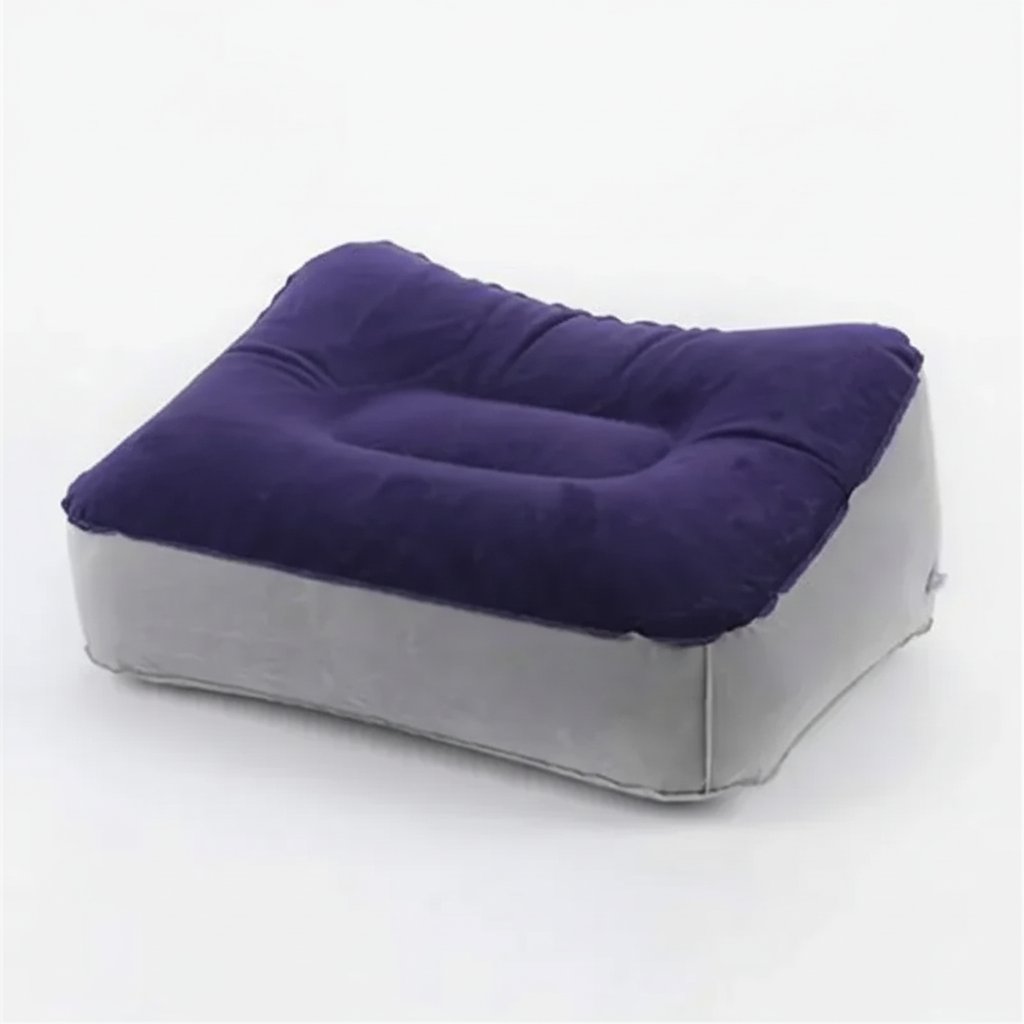 Inflatable travel footrest pillow with adjustable firmness for leg support