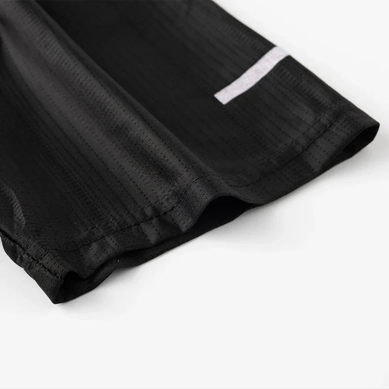 Lightweight running shirt with mesh ventilation and reflective details