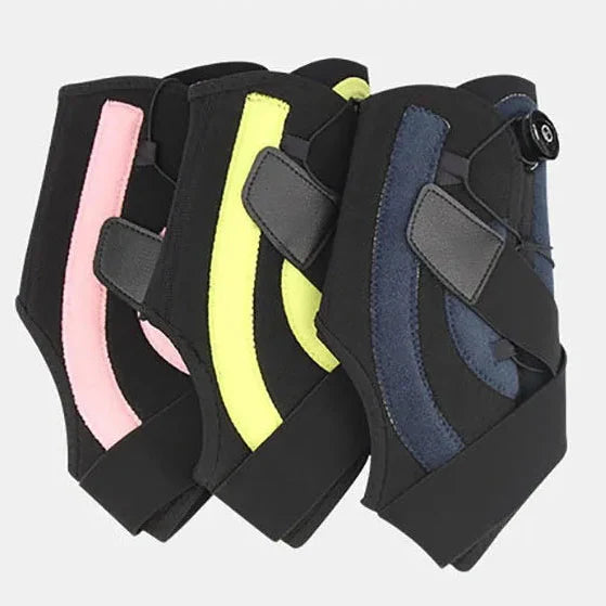 Adjustable ankle support brace with dial compression and stabilisers