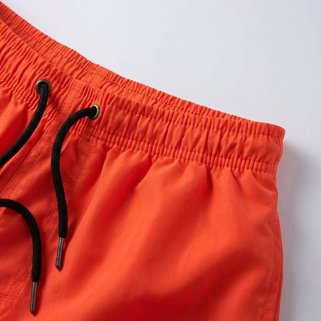 Quick-dry board shorts with breathable design and elastic waistband
