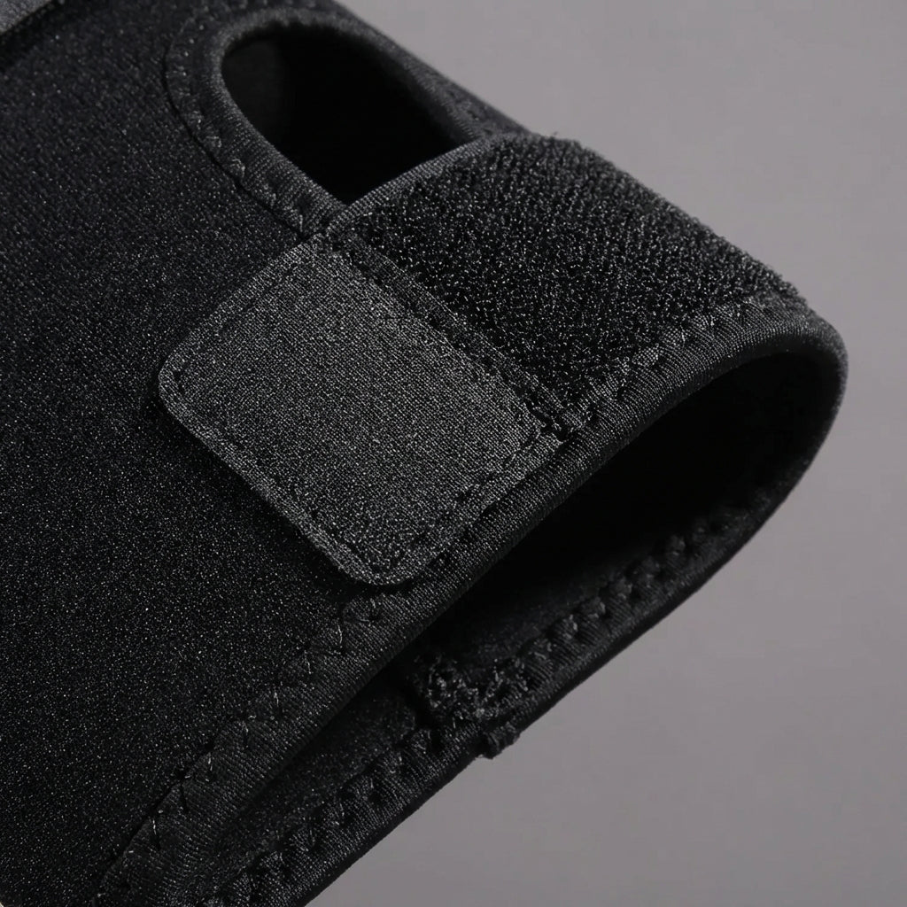 Adjustable elbow support wrap with gentle compression and breathable construction