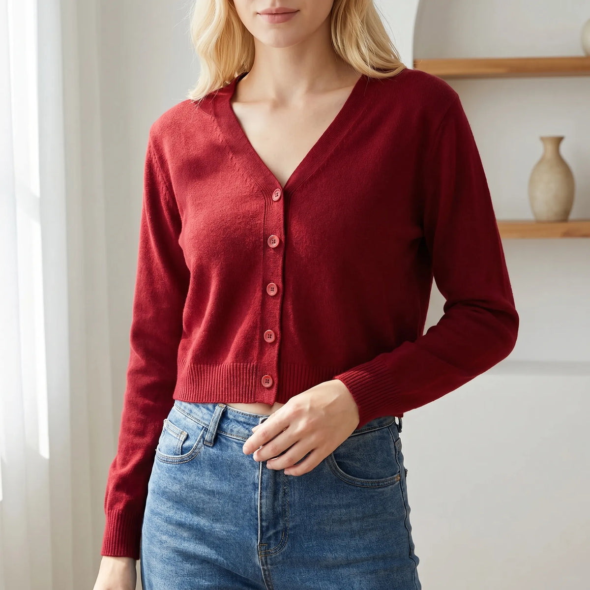 Women's cropped V-neck cardigan with ribbed cuffs and button-down front