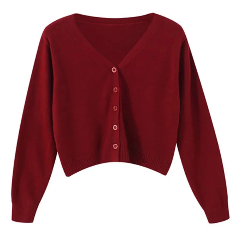 Women's cropped V-neck cardigan with ribbed cuffs and button-down front