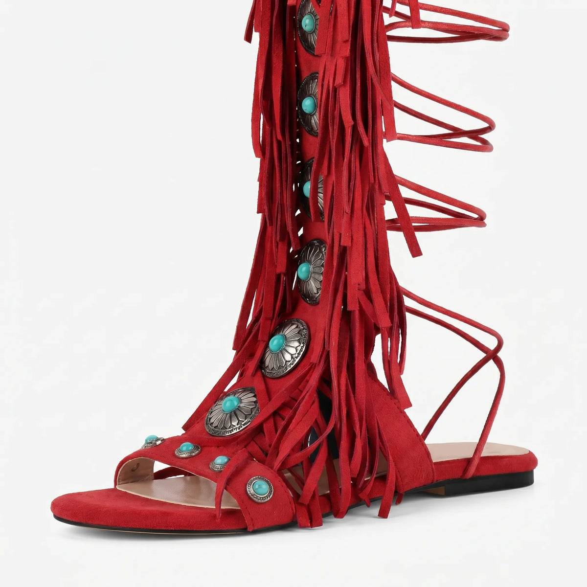 Ankle-high fringe sandals with lace-up closure and metallic stone details