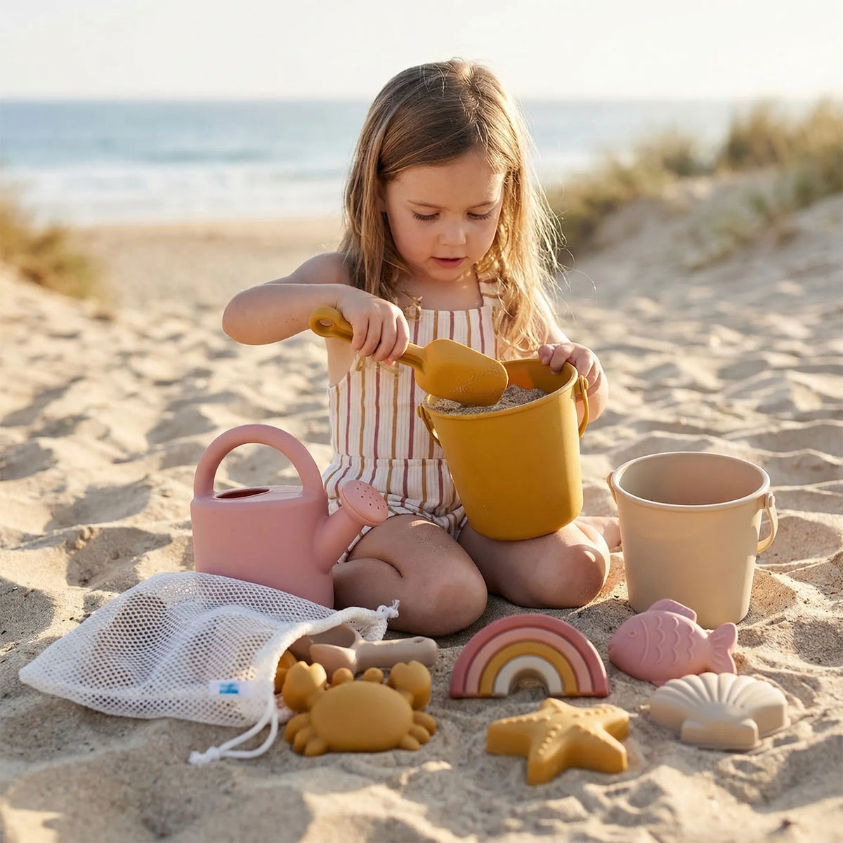 Kids beach toy set with bucket, spade and sea creature sand moulds