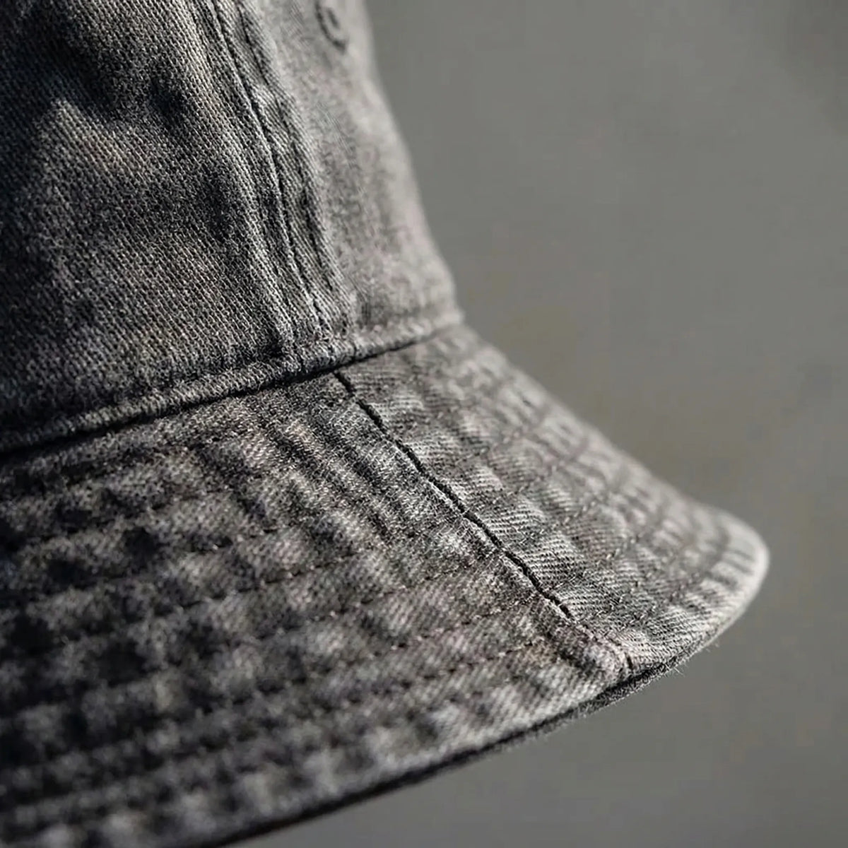 Unisex bucket hat with wide brim for sun protection and outdoor wear