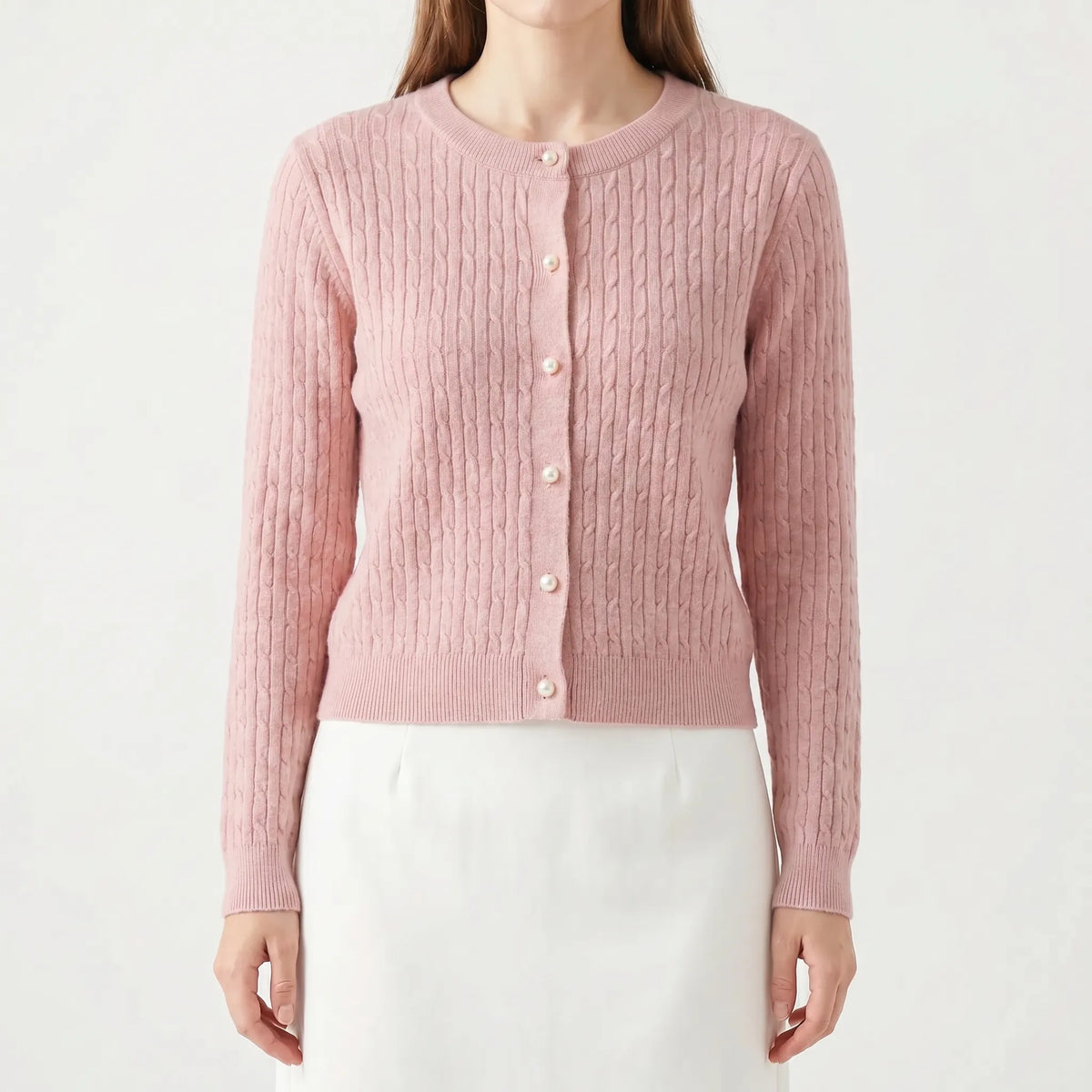 Women's cable knit cardigan with pearl-style buttons and ribbed details