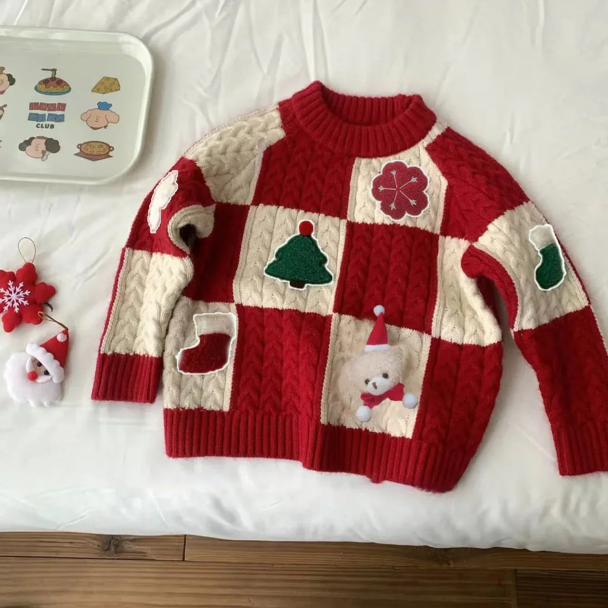 Kids Christmas jumper red cable knit with festive 3D appliqués