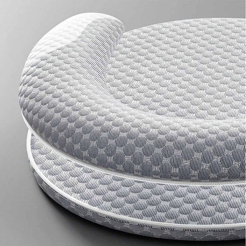 Cooling sofa-style dog bed with honeycomb fabric and raised neck bolster