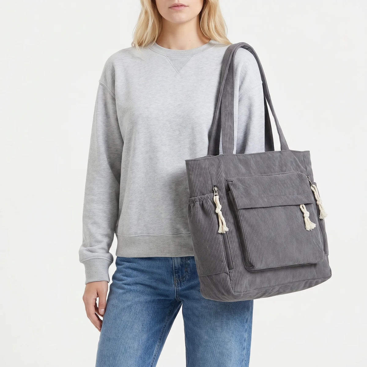 Corduroy shoulder tote with multiple external pockets and rope details