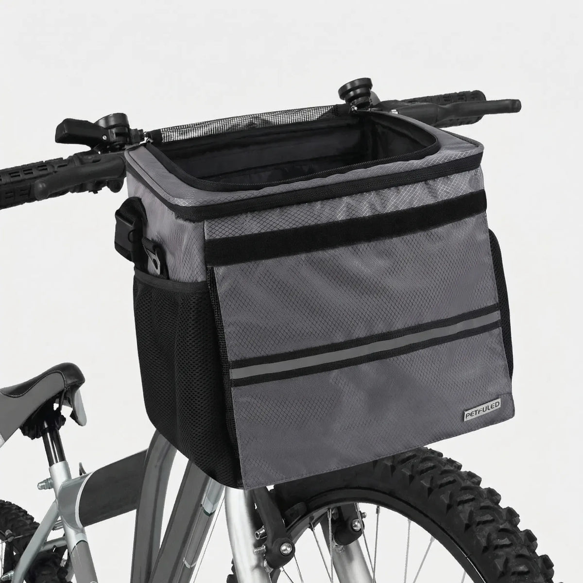 Collapsible bike front pet carrier with mesh panels and suspension