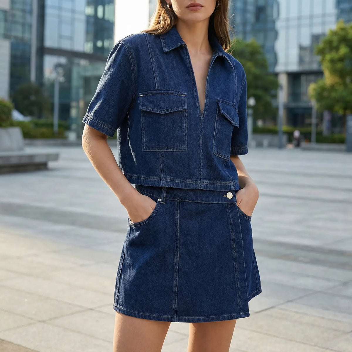 Women's denim co-ord set with cropped top and asymmetric mini skirt