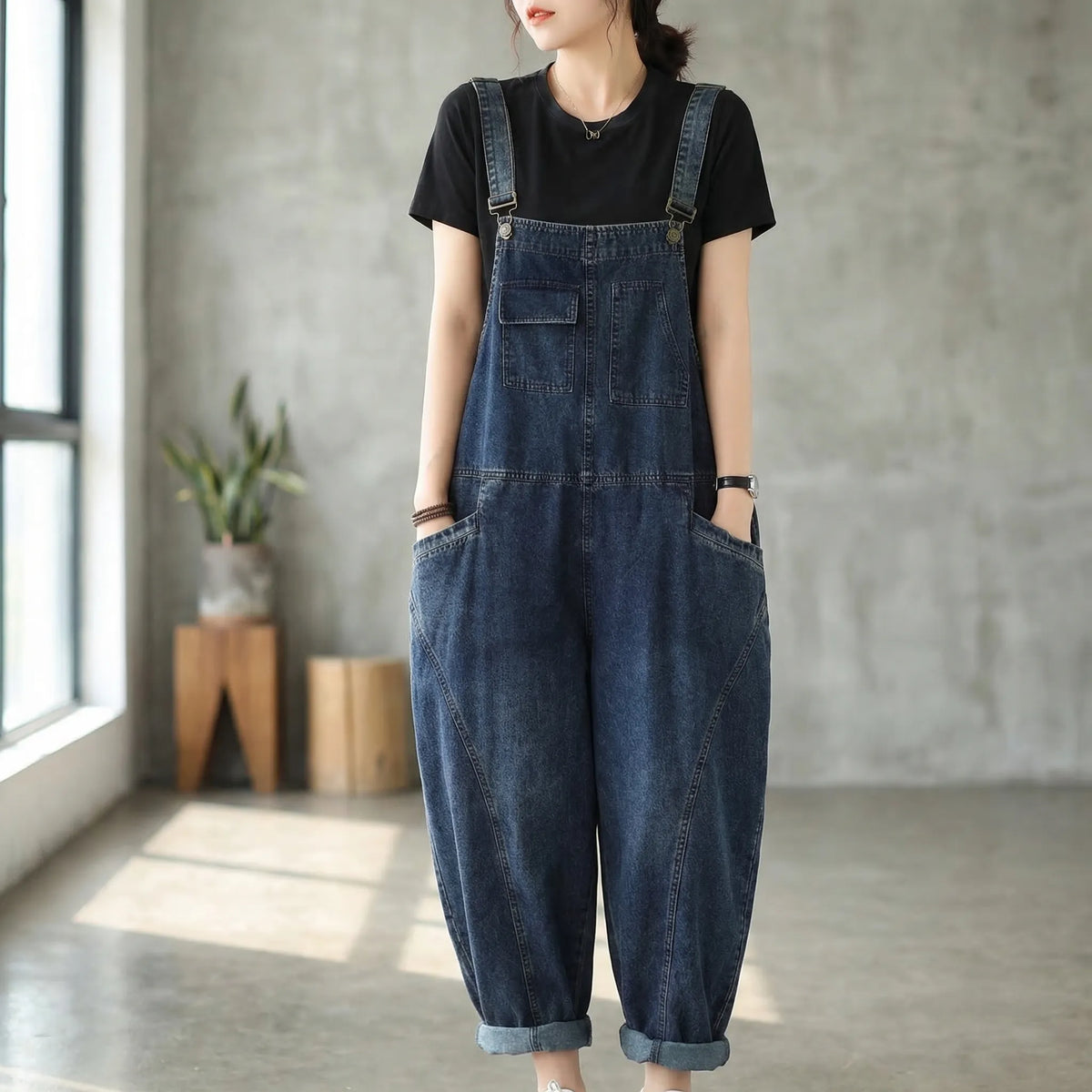 Relaxed fit denim dungarees with harem-style legs and patchwork panel details