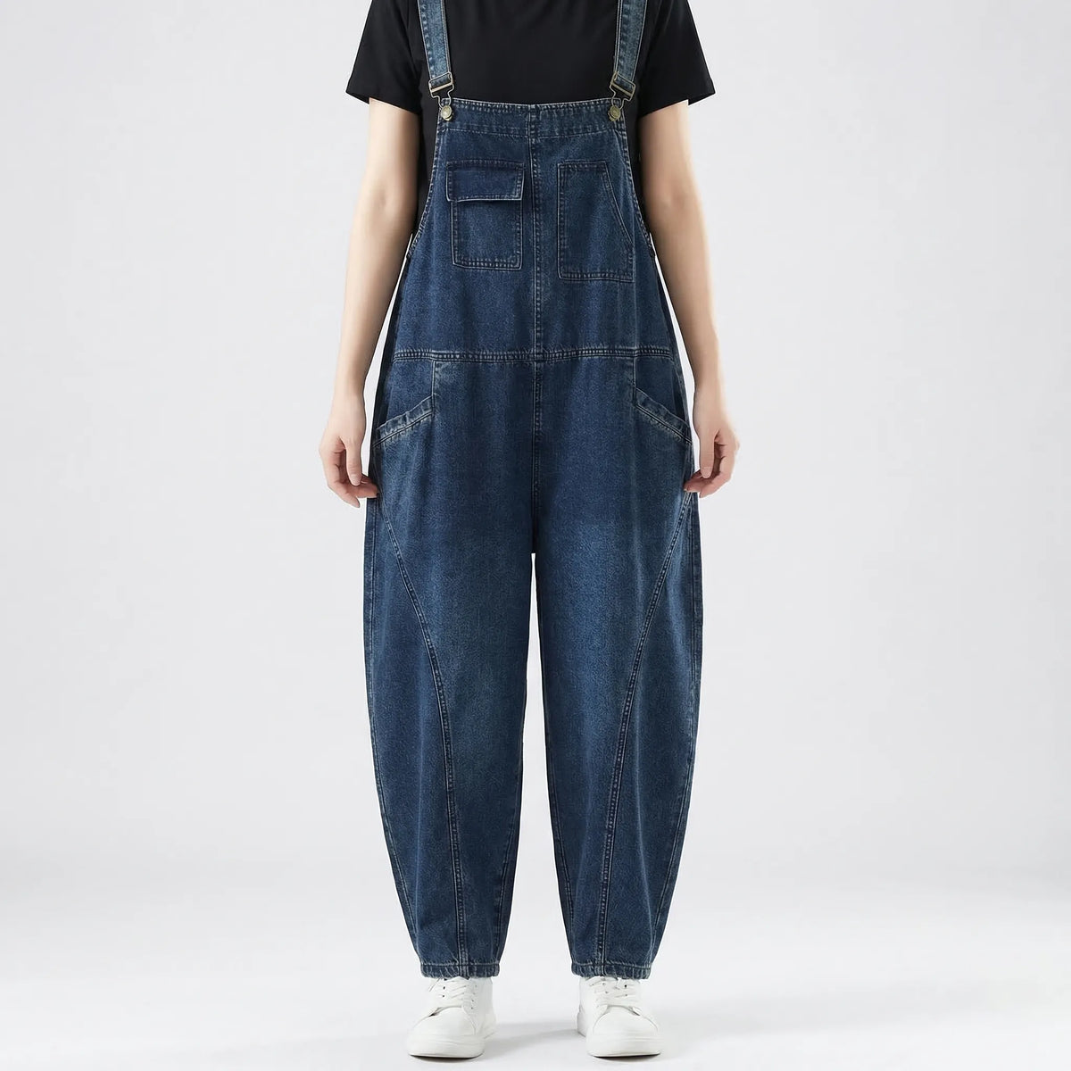 Relaxed fit denim dungarees with harem-style legs and patchwork panel details