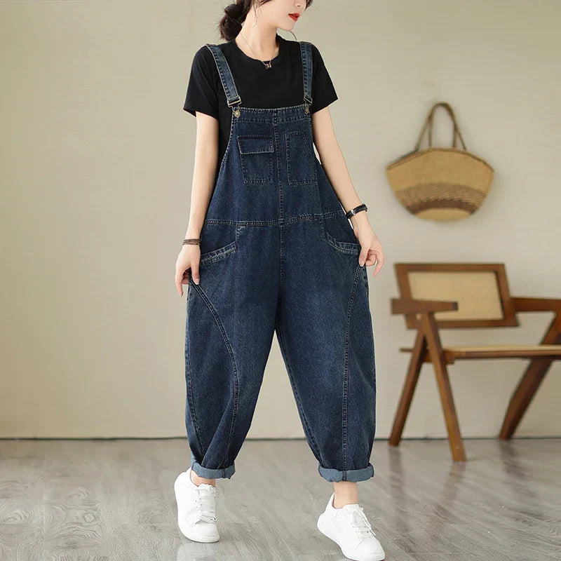 Relaxed fit denim dungarees with harem-style legs and patchwork panel details