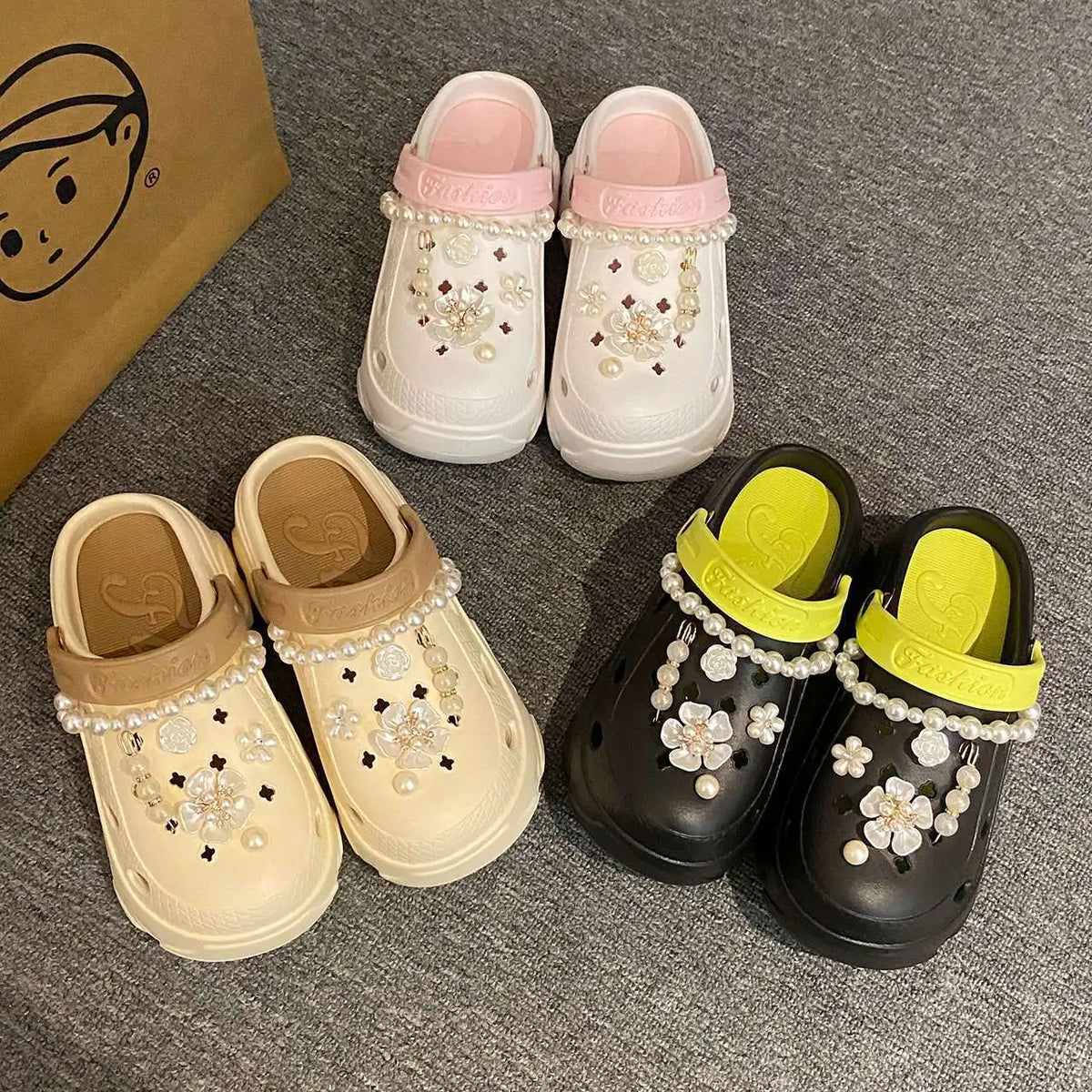 Chunky platform summer clogs with faux pearls and flower embellishments