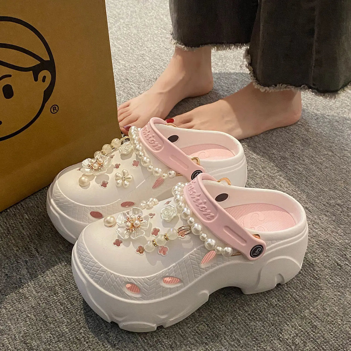 Chunky platform summer clogs with faux pearls and flower embellishments