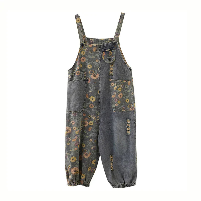 Denim dungaree with large-scale floral print and wide tapered leg