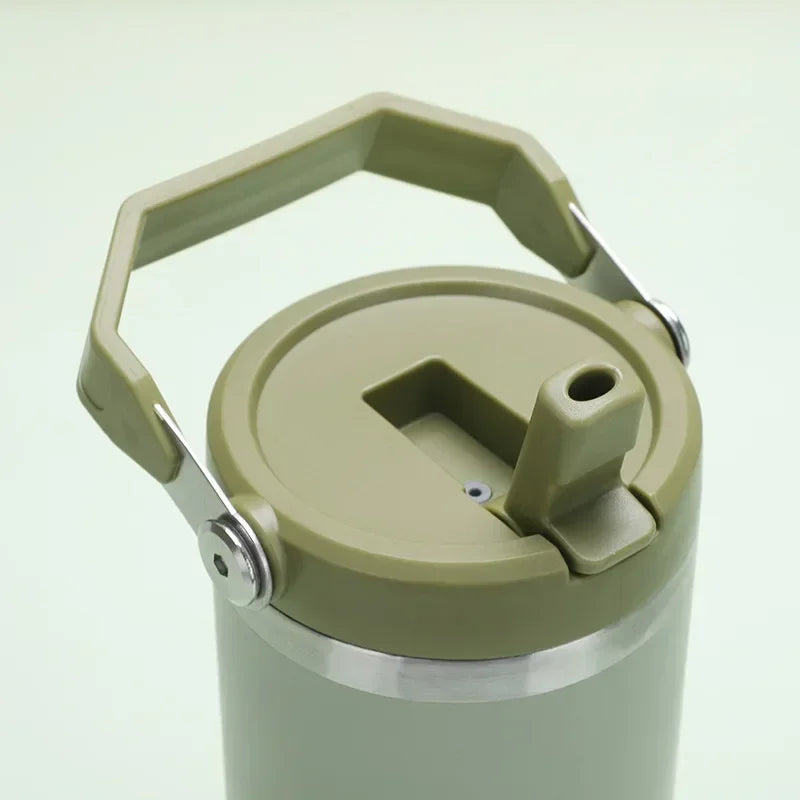 Insulated stainless steel tumbler with detachable carry handle