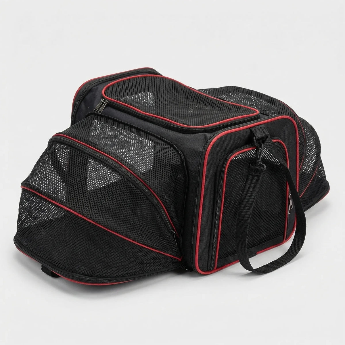 Expandable pet carrier with mesh panels and shoulder strap