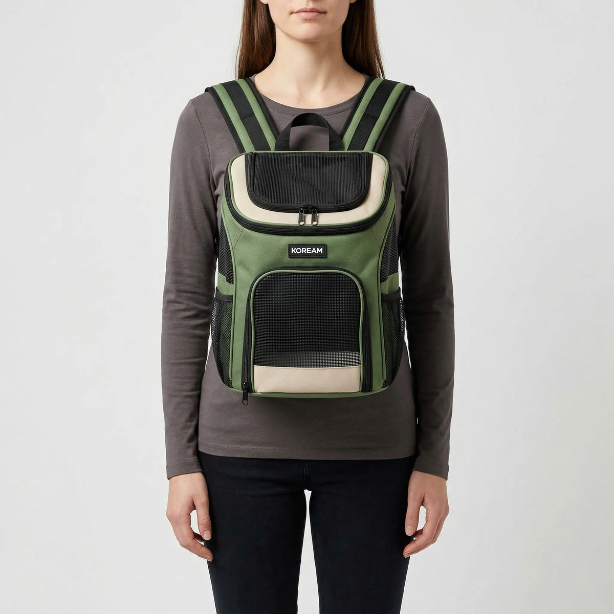 Front chest pet carrier with breathable mesh panels and open top design