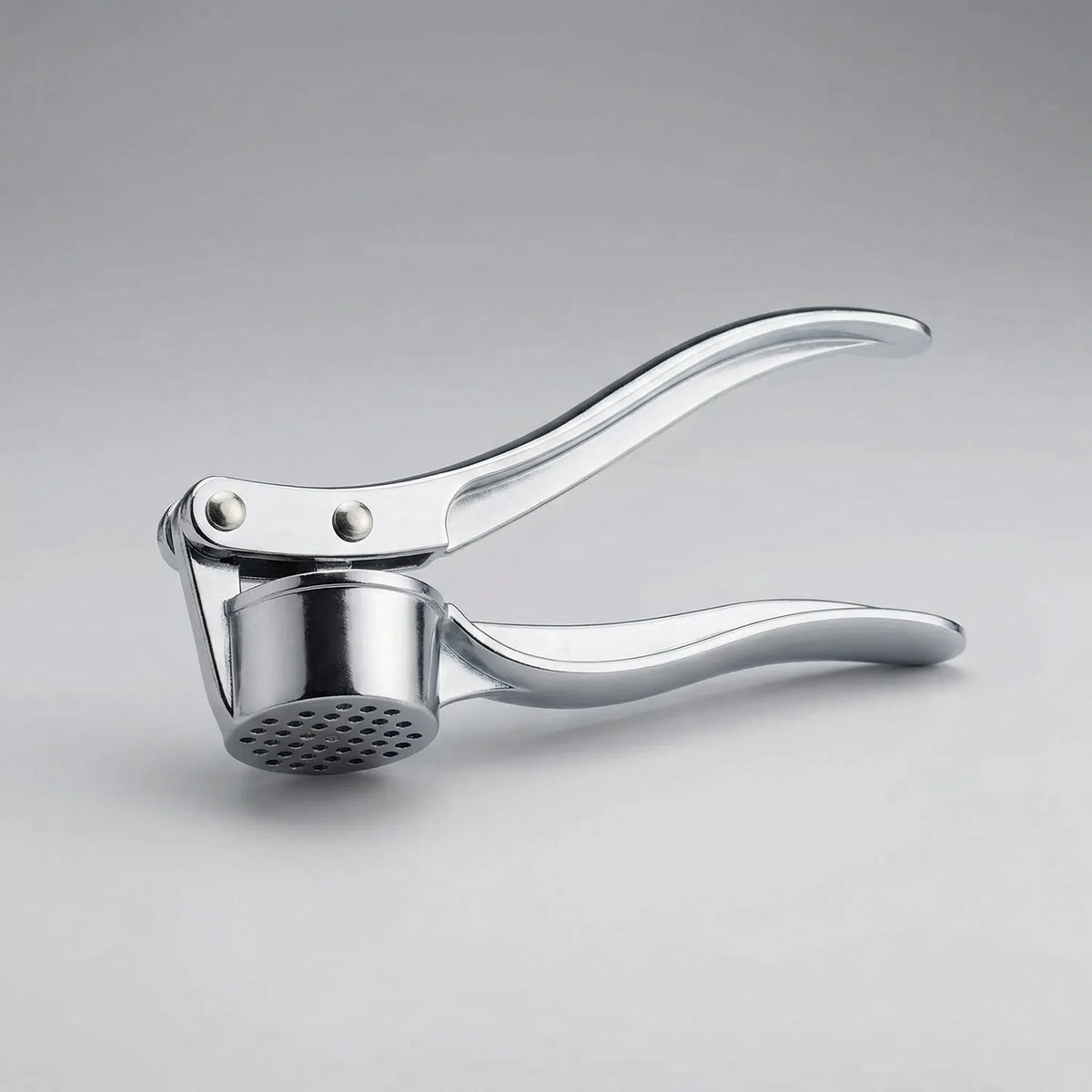 Garlic press hand press tool for crushing garlic in kitchen