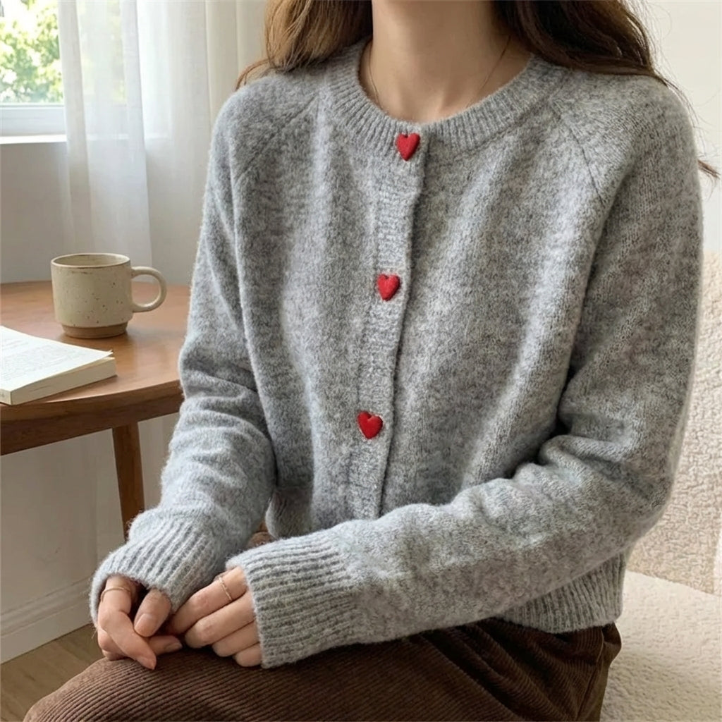 Deep grey chunky knitted cardigan with dropped shoulder sleeves and heart buttons
