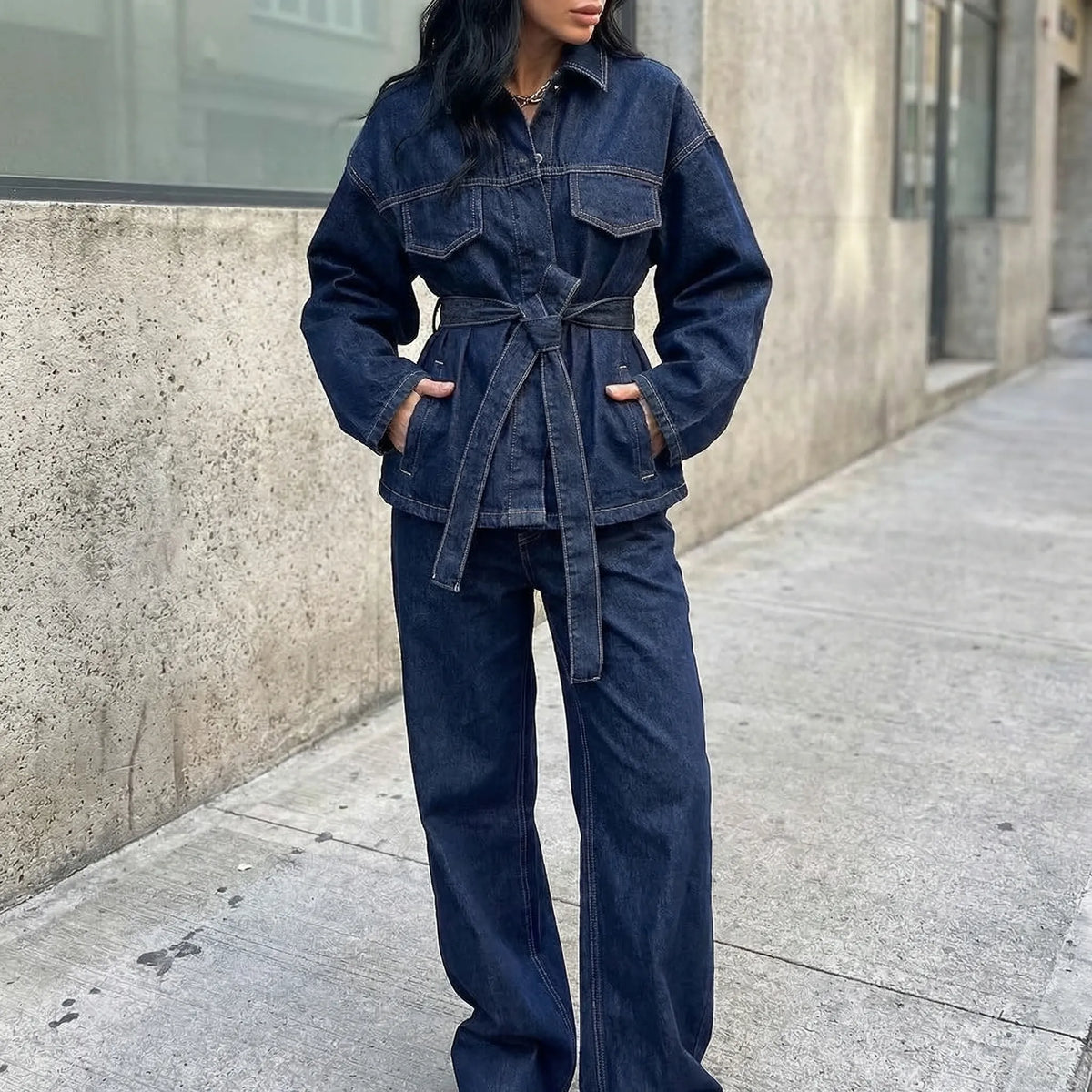 Women's denim co-ord set with belted jacket and wide-leg pants in indigo wash
