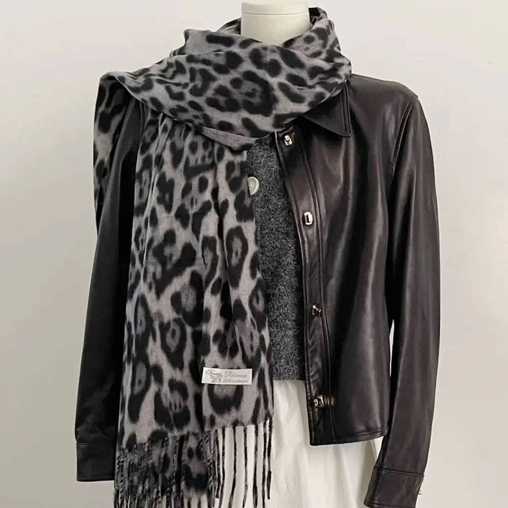 Leopard print knit shawl with tassel detailing warm winter wrap