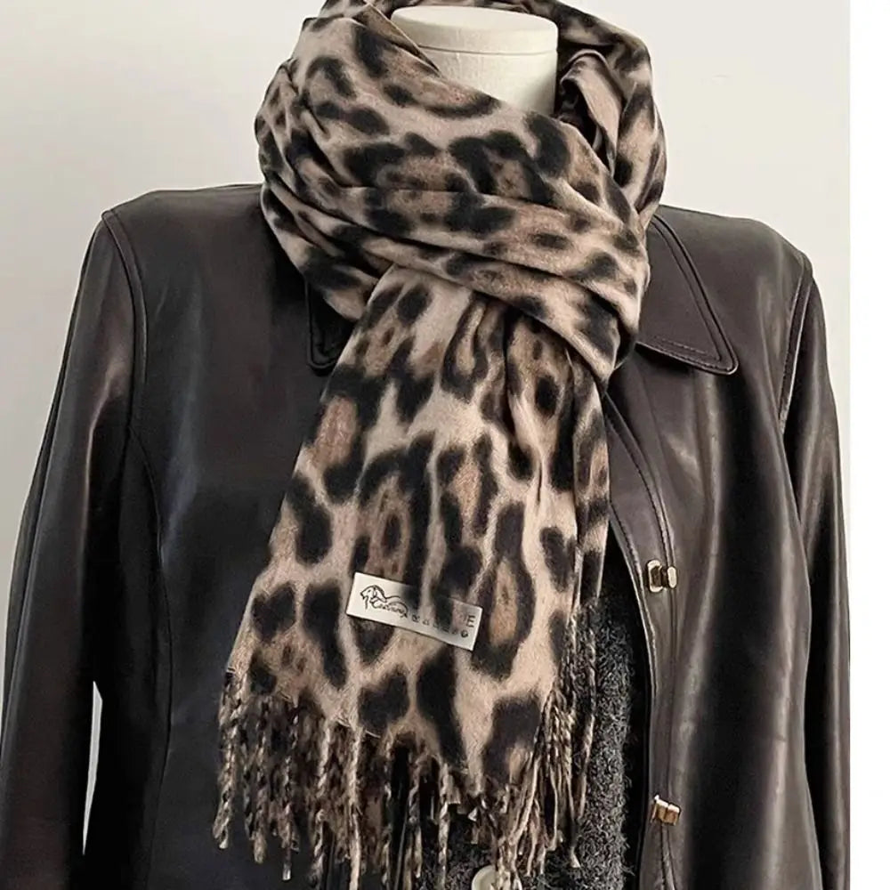 Leopard print knit shawl with tassel detailing warm winter wrap