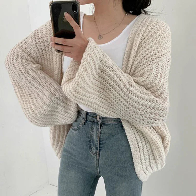 Women's chunky knit cardigan with lantern sleeves and open front