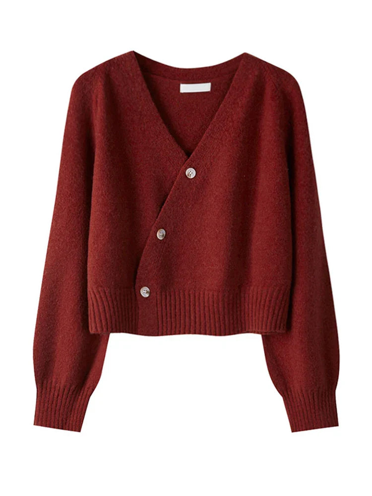 Women's asymmetrical knit cardigan with relaxed fit and cropped length