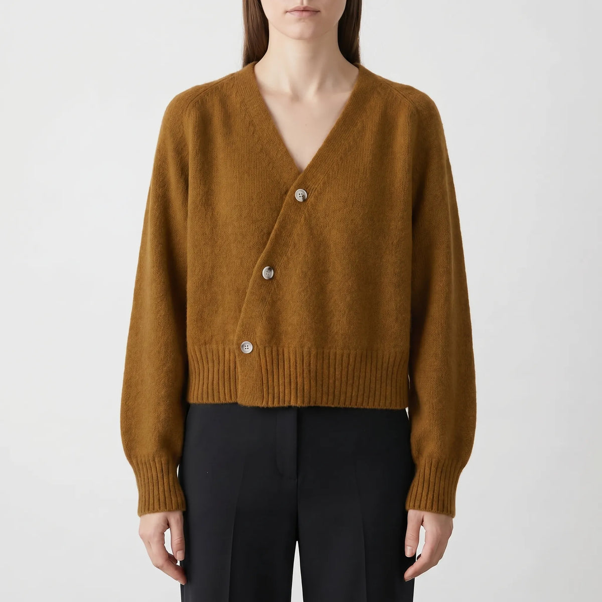 Women's asymmetrical knit cardigan with relaxed fit and cropped length