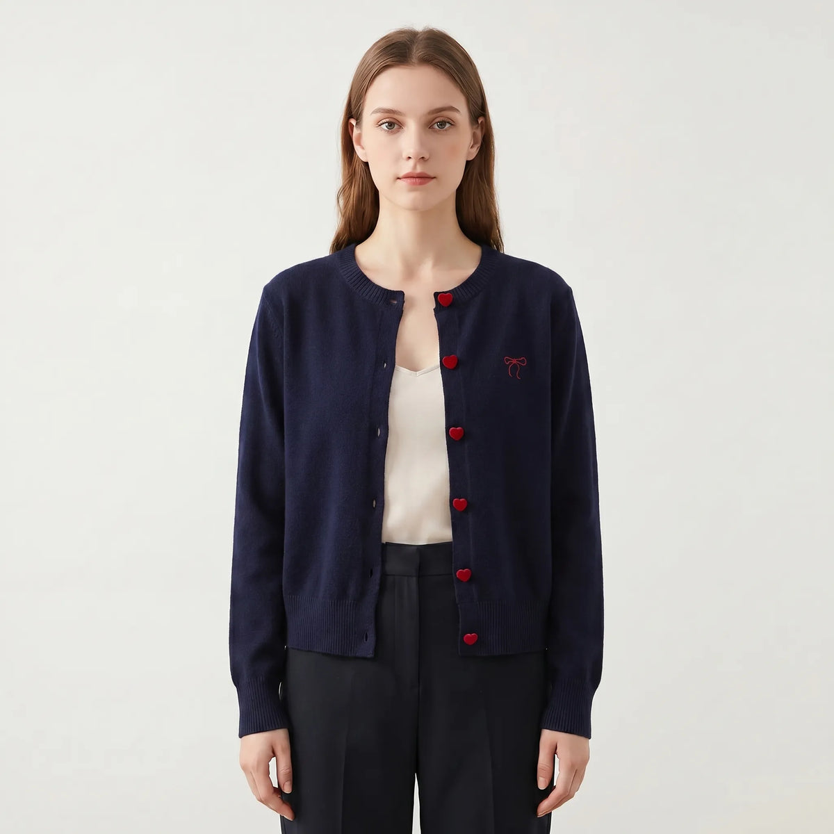 Women's knitted cardigan with heart-shaped buttons and bow embroidery