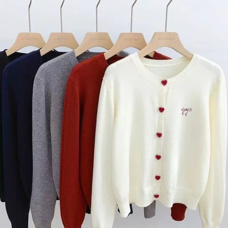 Women's knitted cardigan with heart-shaped buttons and bow embroidery