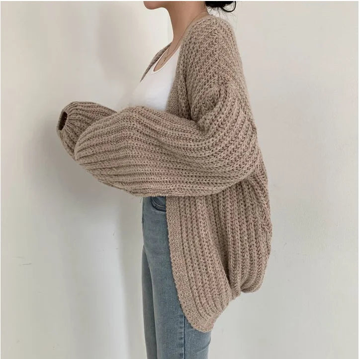 Oversized lantern sleeve cardigan with textured ribbed knit and dropped shoulders