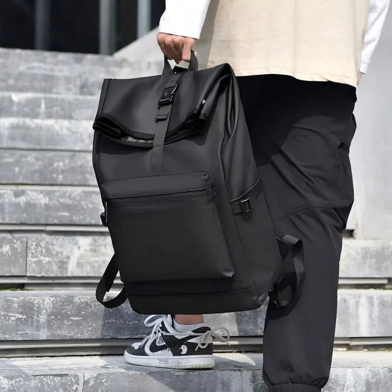 Large capacity commuter backpack with multiple compartments and adjustable padded straps