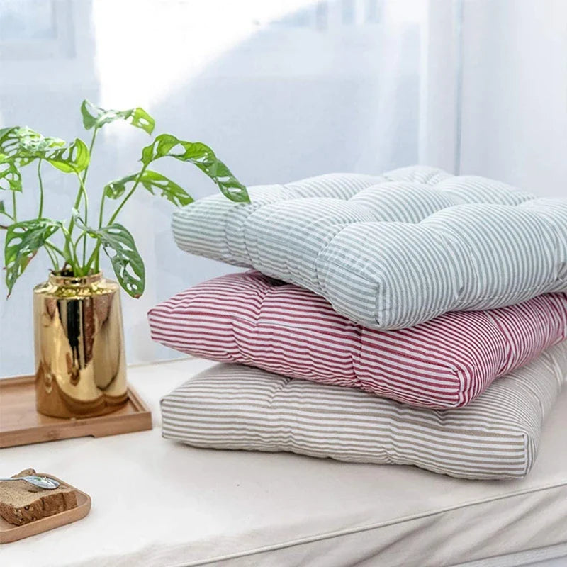 Thick tufted square floor cushion with neutral stripe pattern for meditation and seating