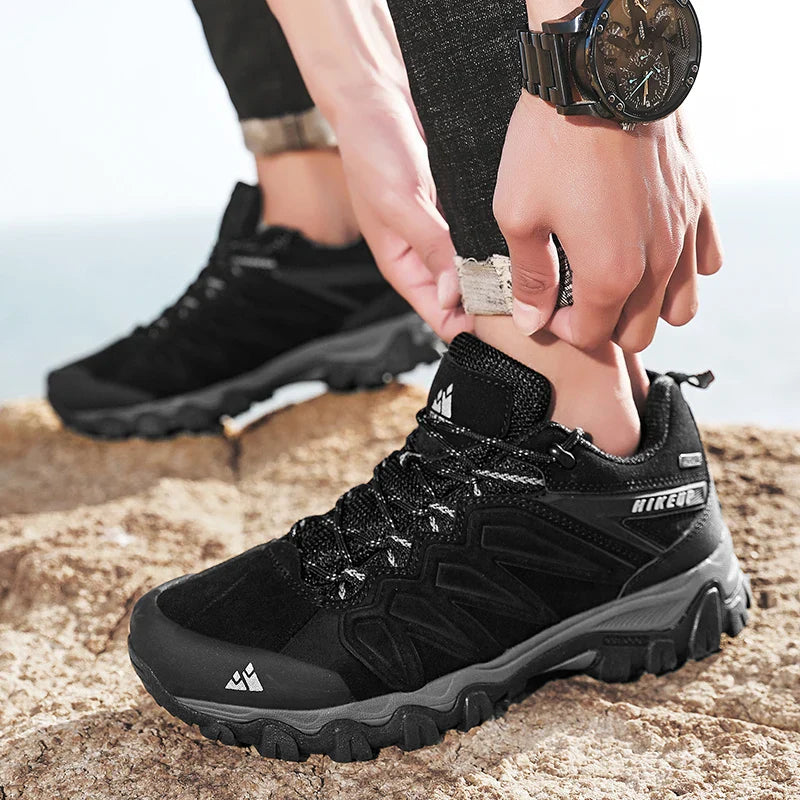 Men's leather hiking shoe with aggressive tread sole