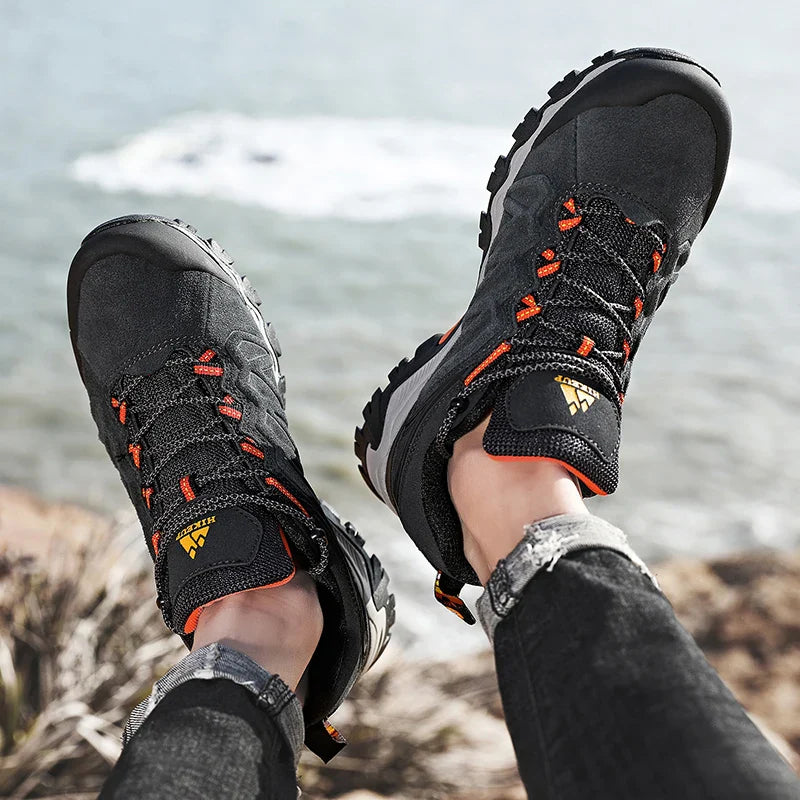 Men's leather hiking shoe with aggressive tread sole