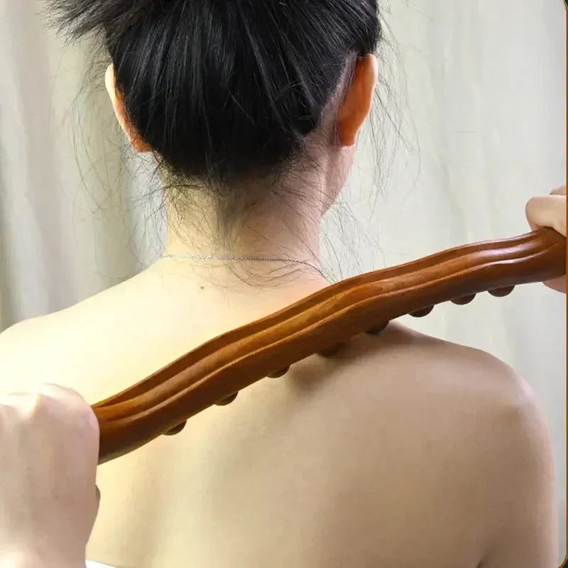 Carbonised wood massage stick with eight rolling beads for back and shoulder massage