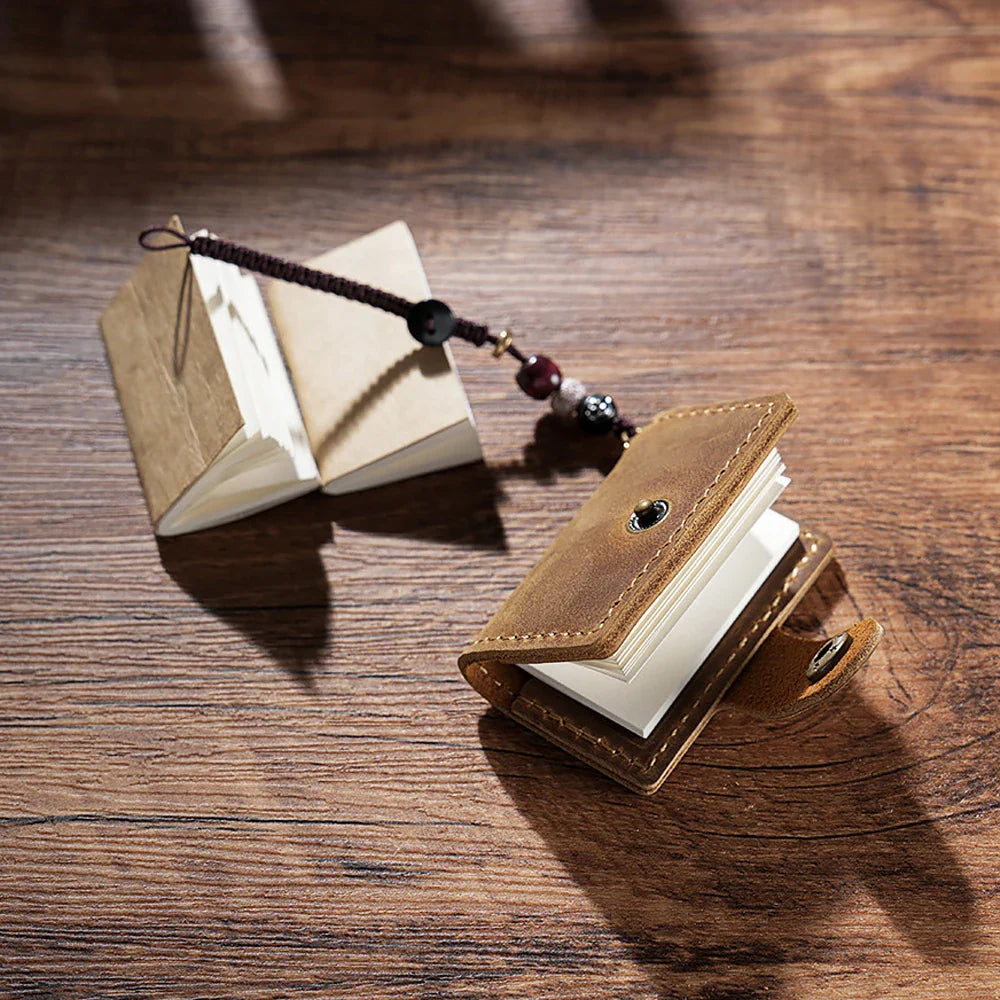 Mini pocket notebook with vintage retro finish and snap closure