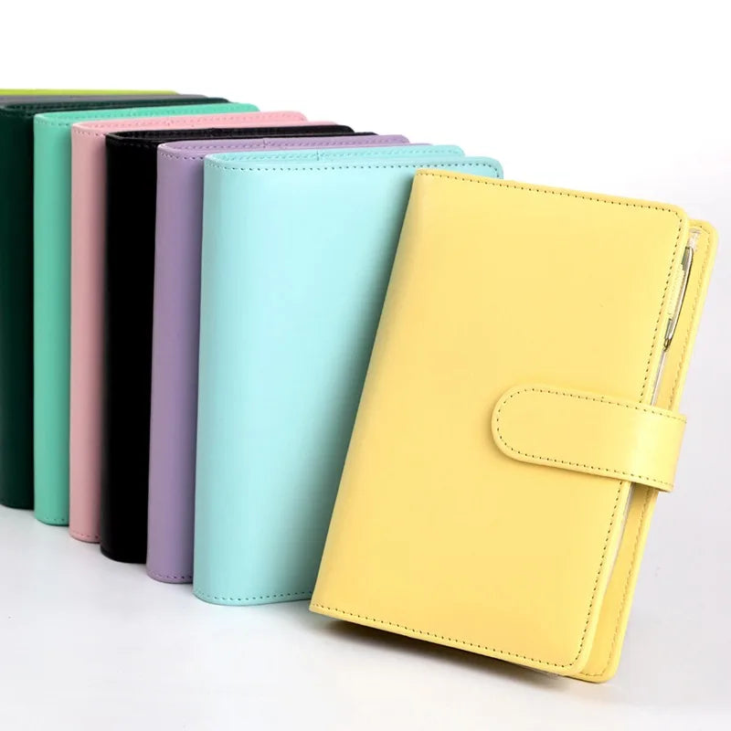 Compact A6 budget binder planner with clear envelope pockets and zip compartments