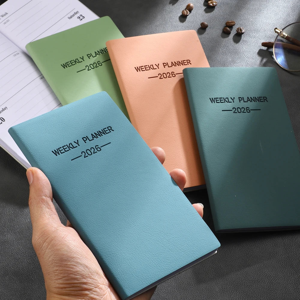 A6 weekly planner notebook with soft textured cover and smooth inner pages