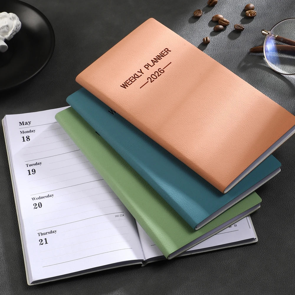 A6 weekly planner notebook with soft textured cover and smooth inner pages