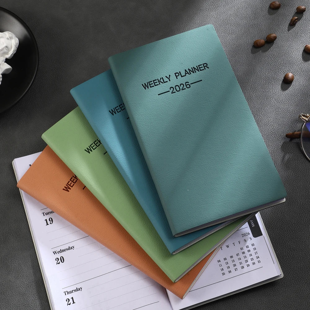 A6 weekly planner notebook with soft textured cover and smooth inner pages