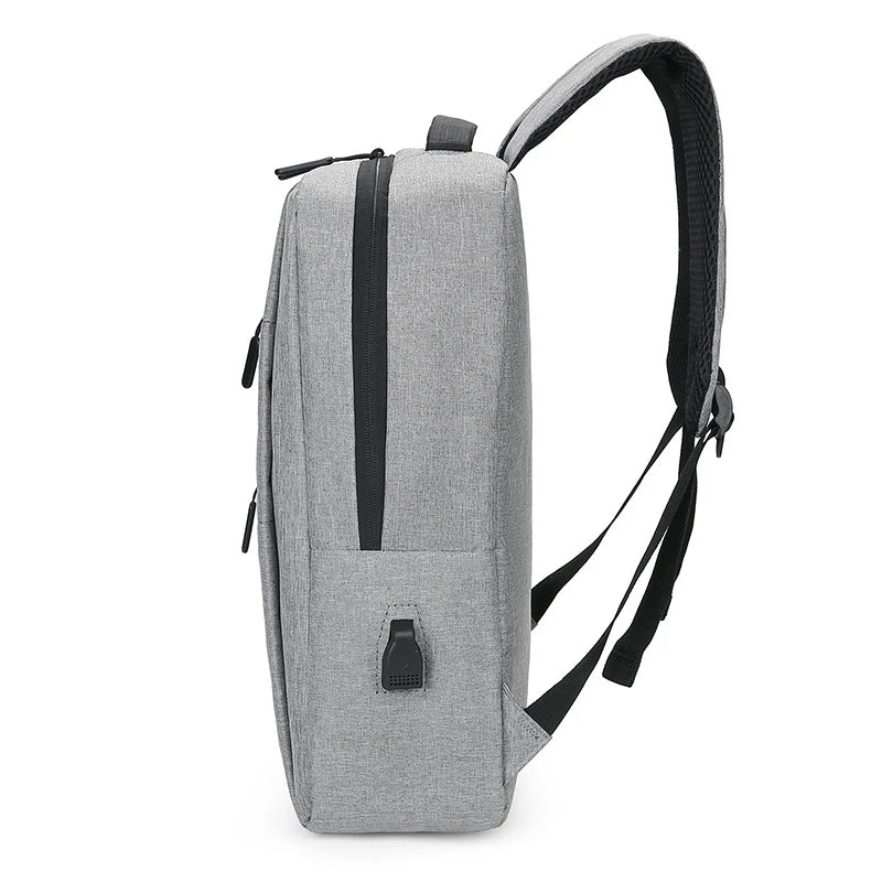 Multi-compartment laptop backpack with padded protection and USB charging port