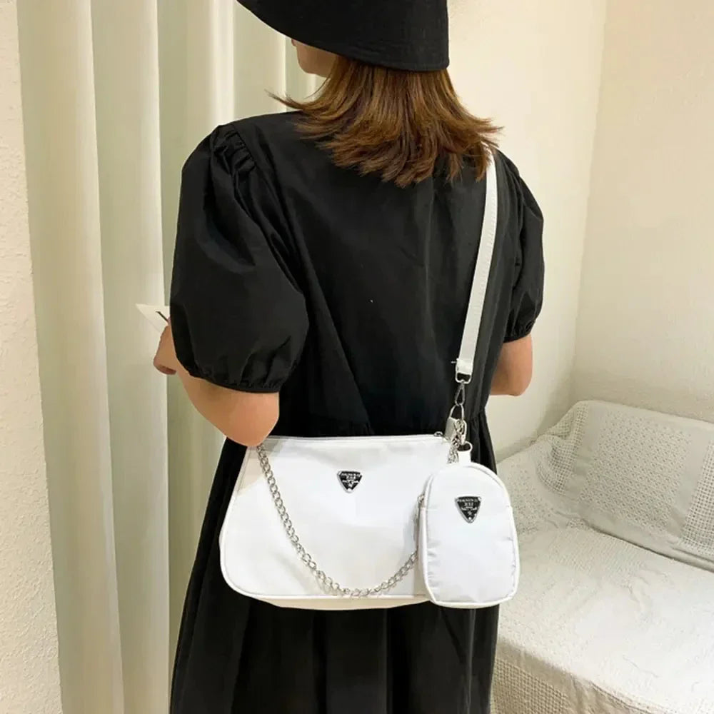 Lightweight nylon crossbody shoulder bag with secure zip and quick-access pocket