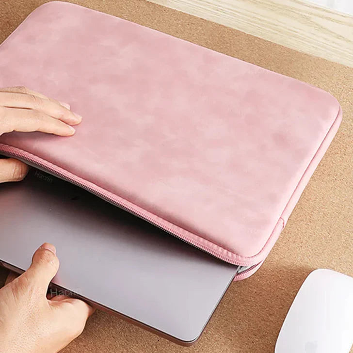 Slim laptop sleeve with water-repellent padding and full-length zip