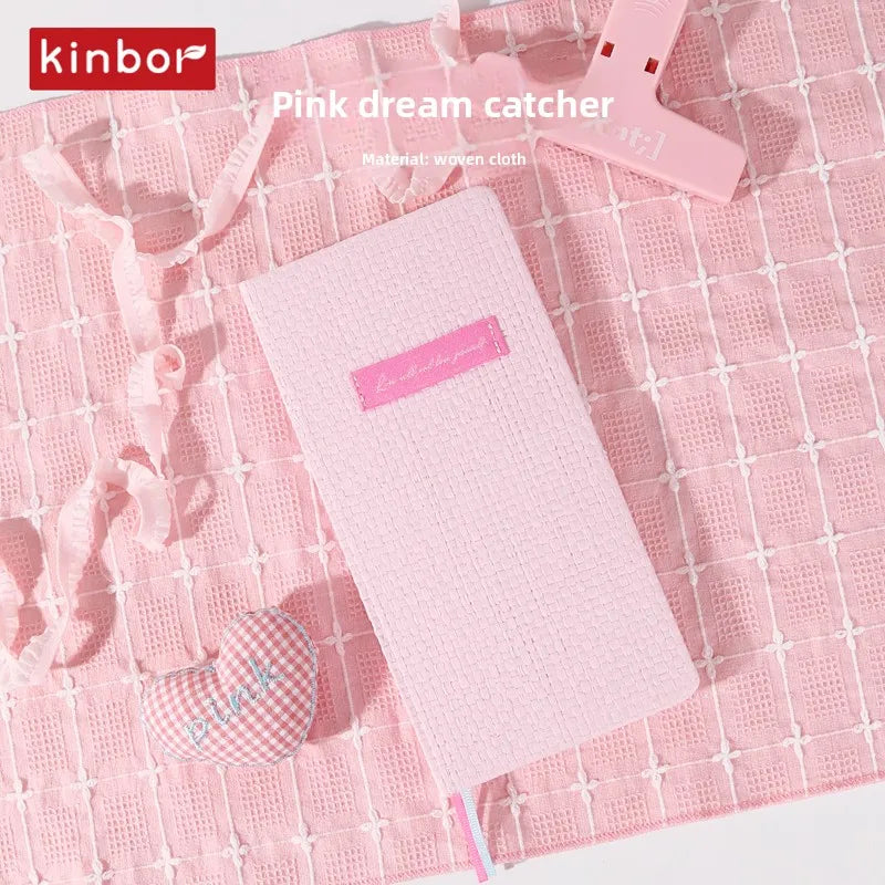 Slim weekly pocket planner with ribbon markers and note sections